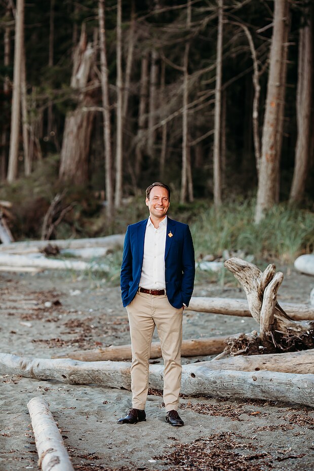 Adam Walker standing on the beach in Qualicum Beach